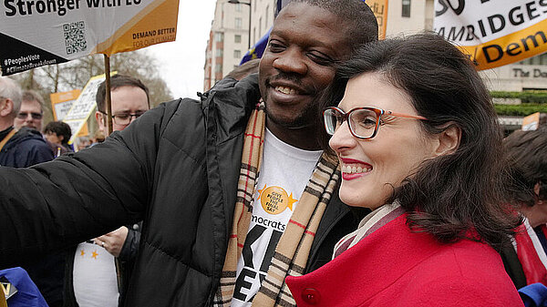 Layla Moran MP in a pose at a protest